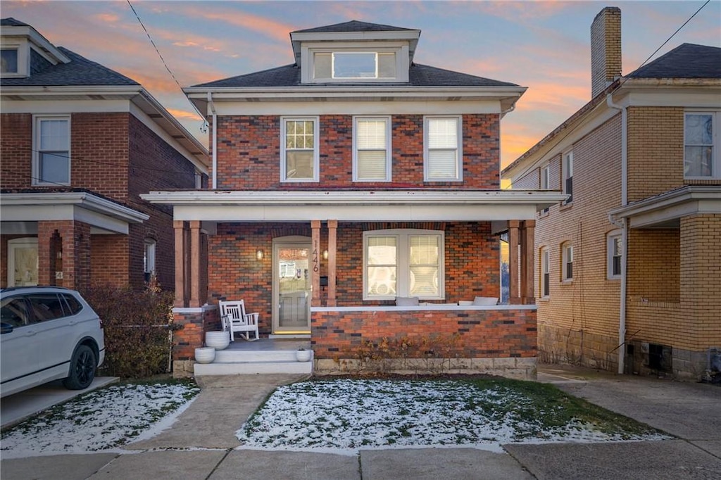 front of property featuring a porch