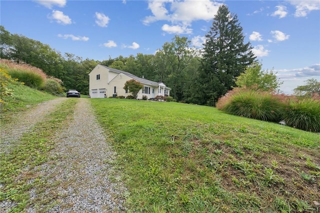 view of yard featuring a garage