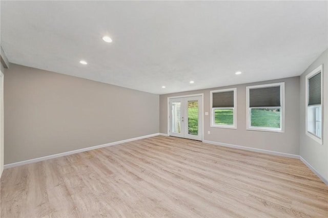 unfurnished room featuring light hardwood / wood-style flooring