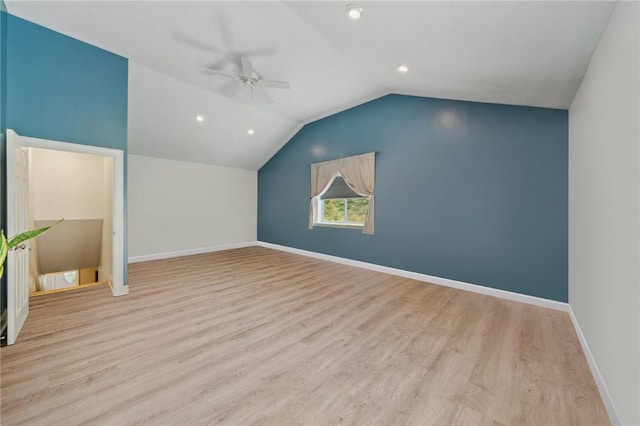 bonus room with ceiling fan, light wood-type flooring, and vaulted ceiling