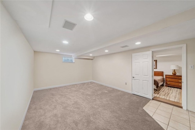 basement with light carpet