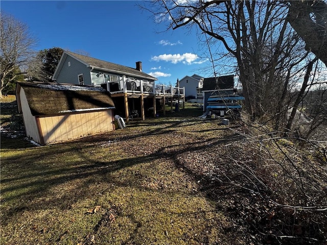 view of yard featuring a deck