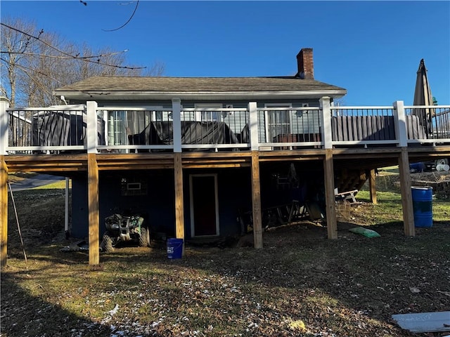 rear view of house with a deck