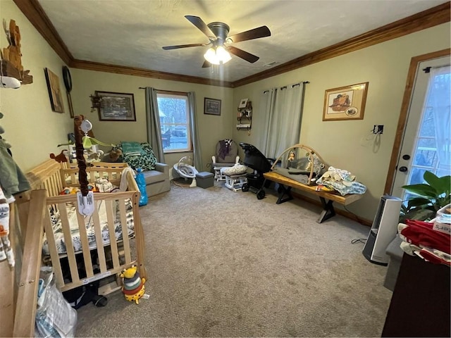 interior space with carpet flooring, crown molding, and ceiling fan