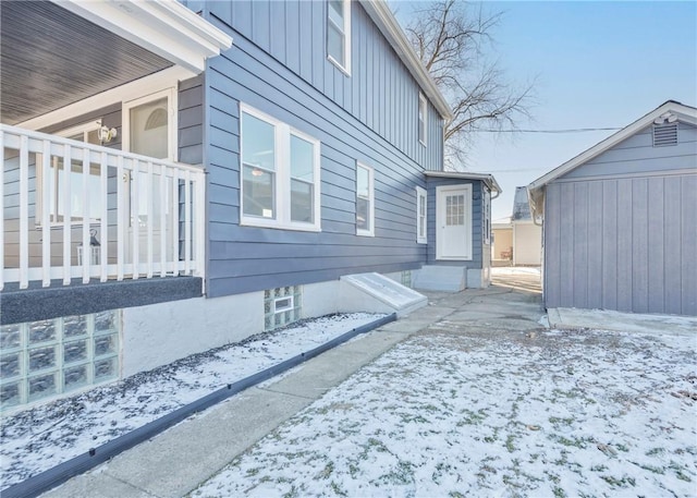 view of snow covered property