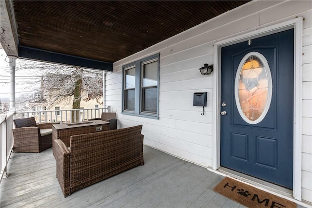 entrance to property with covered porch