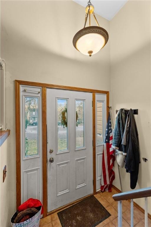 tiled entryway featuring plenty of natural light