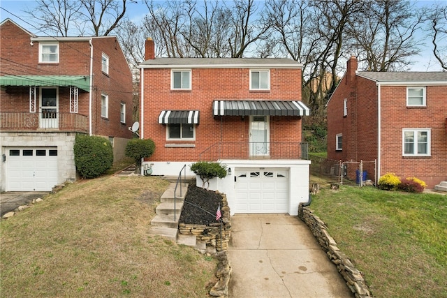 view of front facade featuring a garage and a front lawn