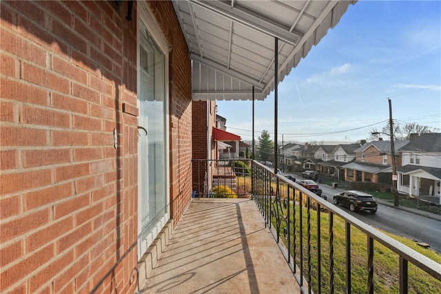 balcony featuring a residential view