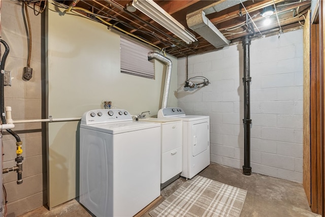 laundry area featuring laundry area and washer and clothes dryer