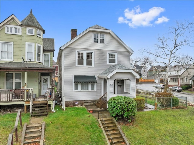 view of front of home with a front lawn