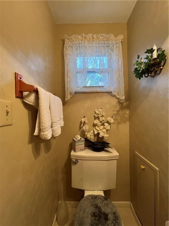 bathroom featuring tile patterned flooring