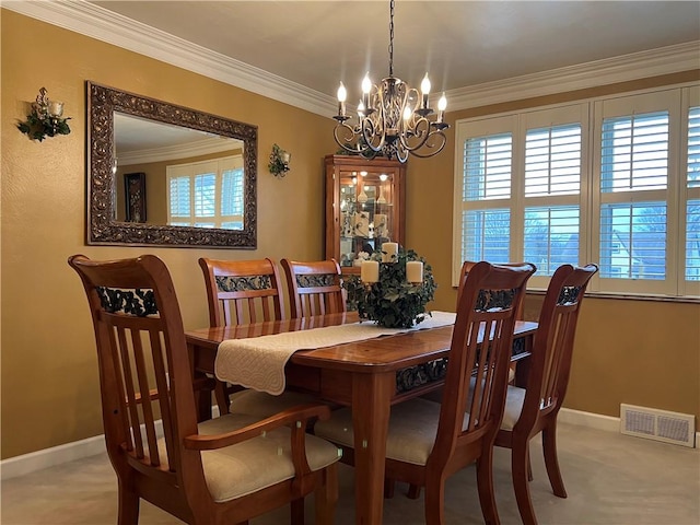 carpeted dining space featuring crown molding and a notable chandelier