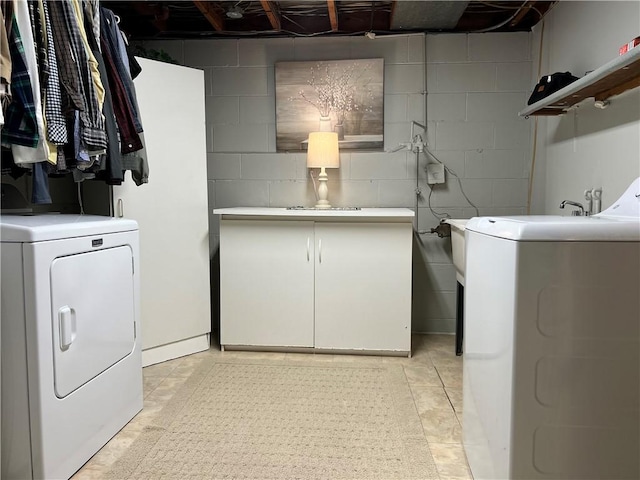 laundry room with cabinets