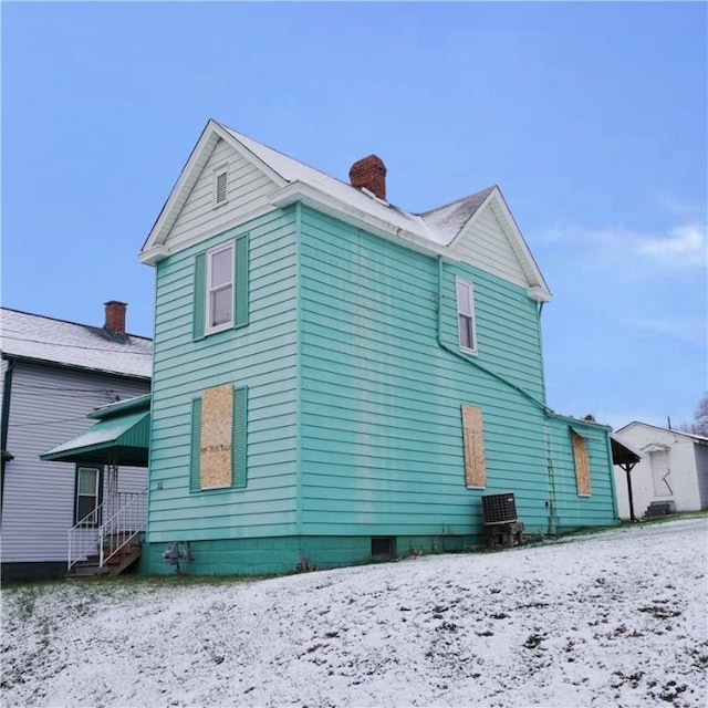 view of snow covered property