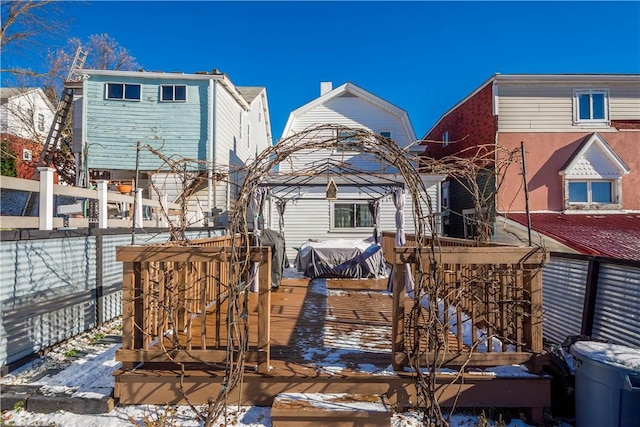 view of snow covered deck