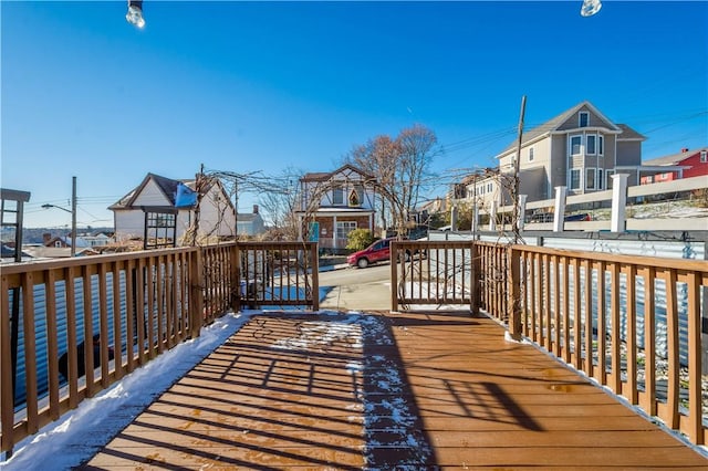 wooden deck featuring covered porch