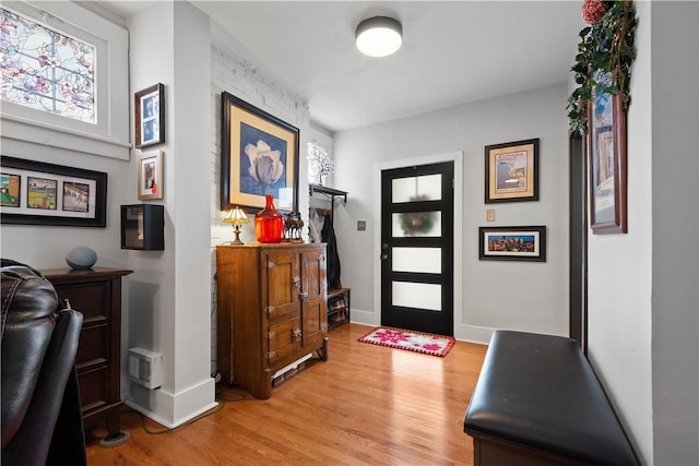 entryway with light hardwood / wood-style flooring