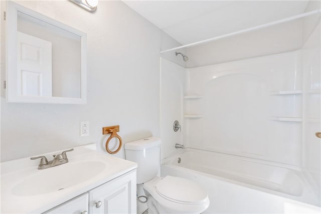 full bathroom with toilet, vanity, and tub / shower combination