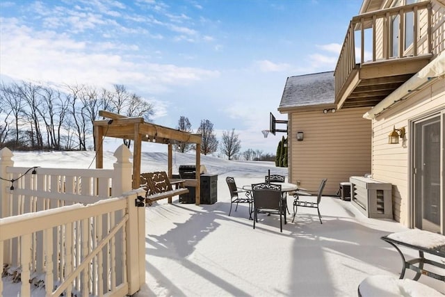 view of snow covered patio