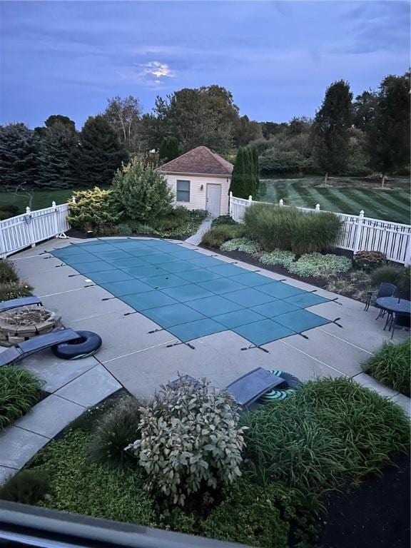 view of pool featuring fence, a fenced in pool, and a patio