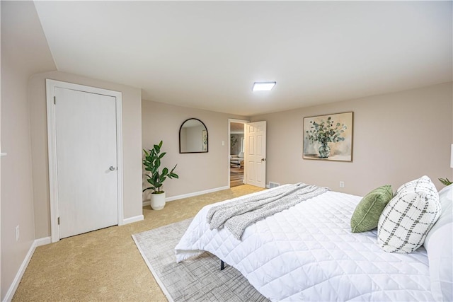 bedroom with light carpet