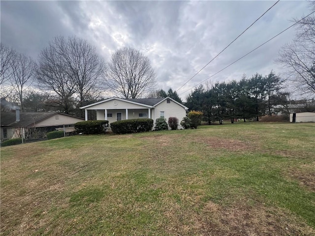 view of front of home with a front yard