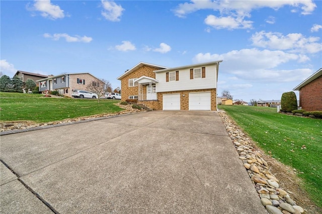 view of front of house with a garage and a front yard