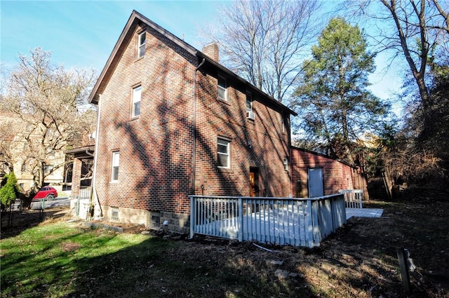 rear view of house with a deck