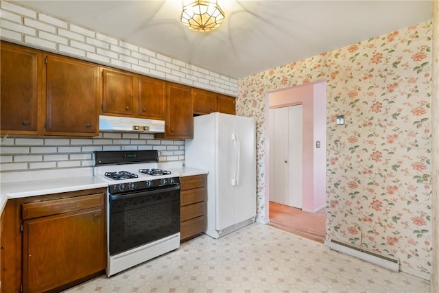 kitchen with white appliances and tasteful backsplash