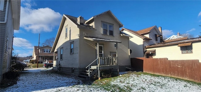 view of snow covered property