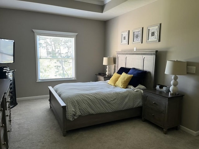 bedroom featuring light colored carpet