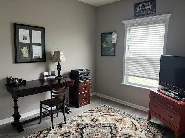 home office featuring light hardwood / wood-style flooring