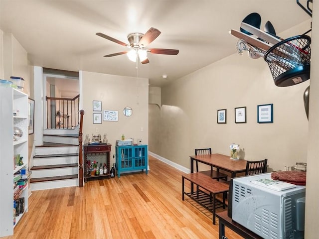 interior space featuring light hardwood / wood-style floors and ceiling fan