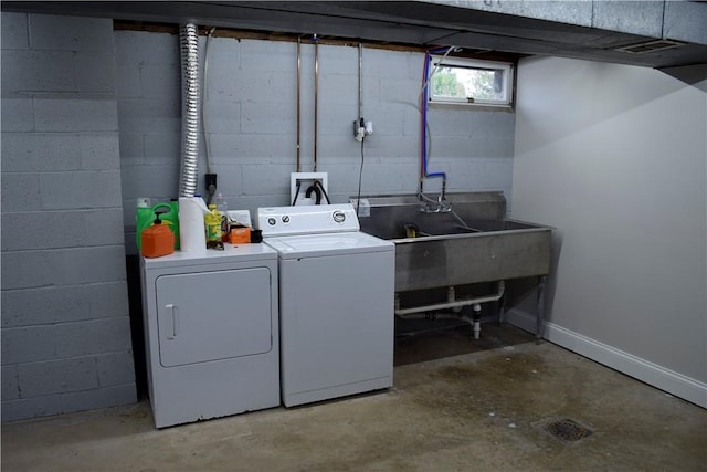 washroom featuring washer and dryer