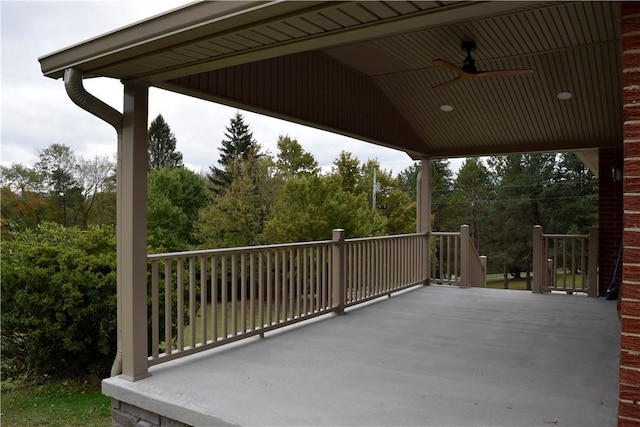 view of patio featuring ceiling fan and a porch