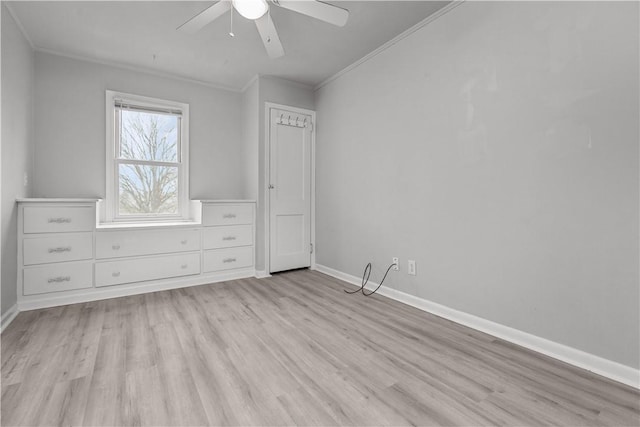 unfurnished bedroom featuring light wood-type flooring, ceiling fan, and crown molding