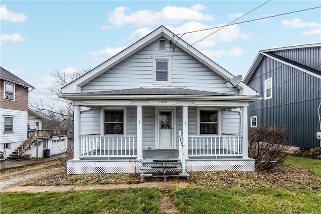 bungalow-style home with a porch