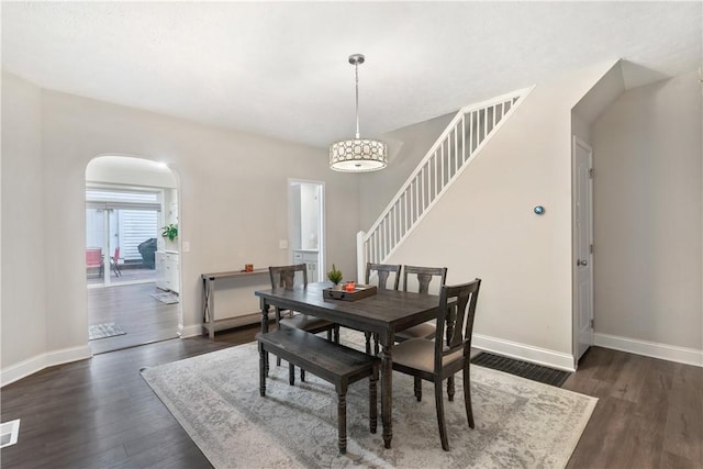 dining room featuring dark hardwood / wood-style flooring