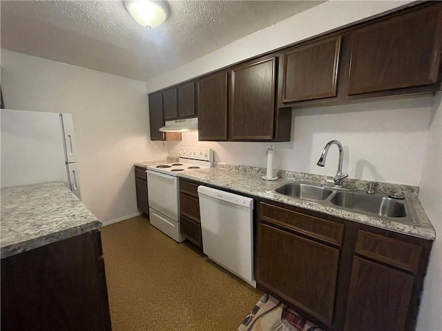 kitchen with a textured ceiling, dark brown cabinets, sink, and white appliances