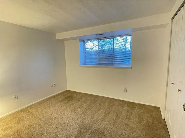 view of carpeted spare room