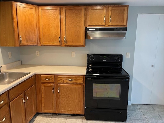 kitchen with black / electric stove, sink, light tile patterned floors, and ventilation hood