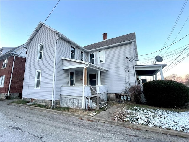 exterior space featuring covered porch