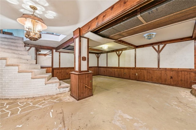 basement with wooden walls