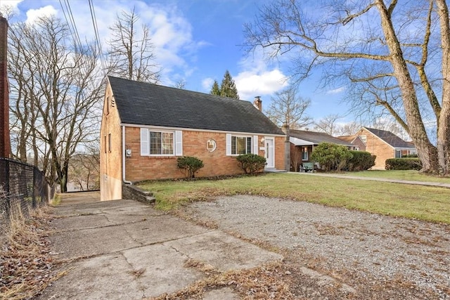 view of front of property with a front lawn