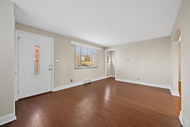 entryway featuring dark wood-type flooring