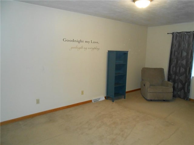 unfurnished room with carpet flooring