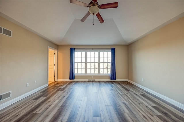 unfurnished room featuring hardwood / wood-style floors, vaulted ceiling, and ceiling fan