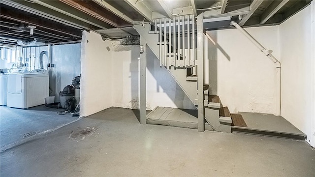 basement featuring washer and clothes dryer