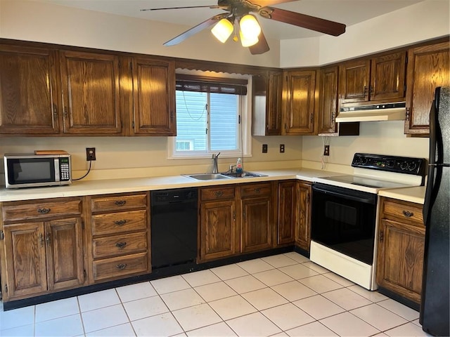 kitchen featuring black appliances, ceiling fan, light tile patterned floors, and sink